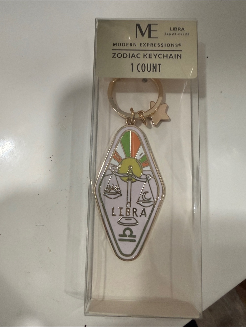 Expressions Libra Enamel Keychain – White, Gold & Green Accents